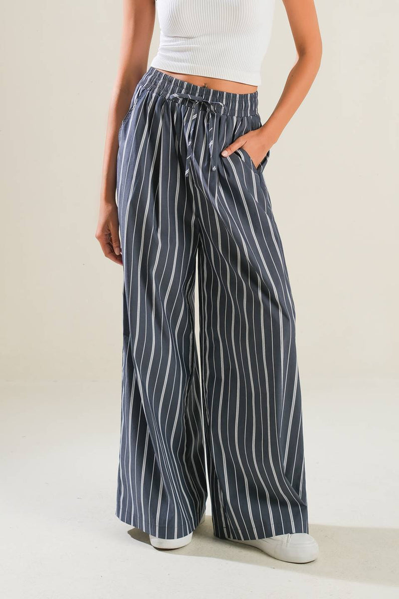 BEHIND THE GRIN gewebte Hose