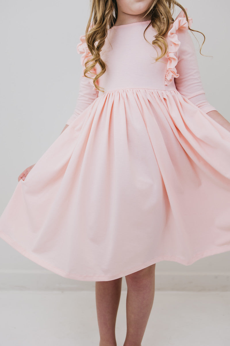 3/4 Kleid mit schwingendem Rock – Rüschen, Blütenform, Rosa