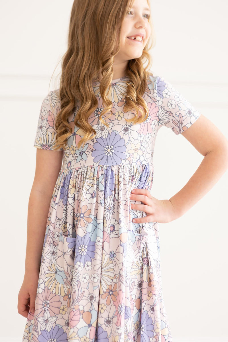 Sweet Escape Kleid mit schwingendem Rock – Blumenmuster, Taschen, Kurzarm