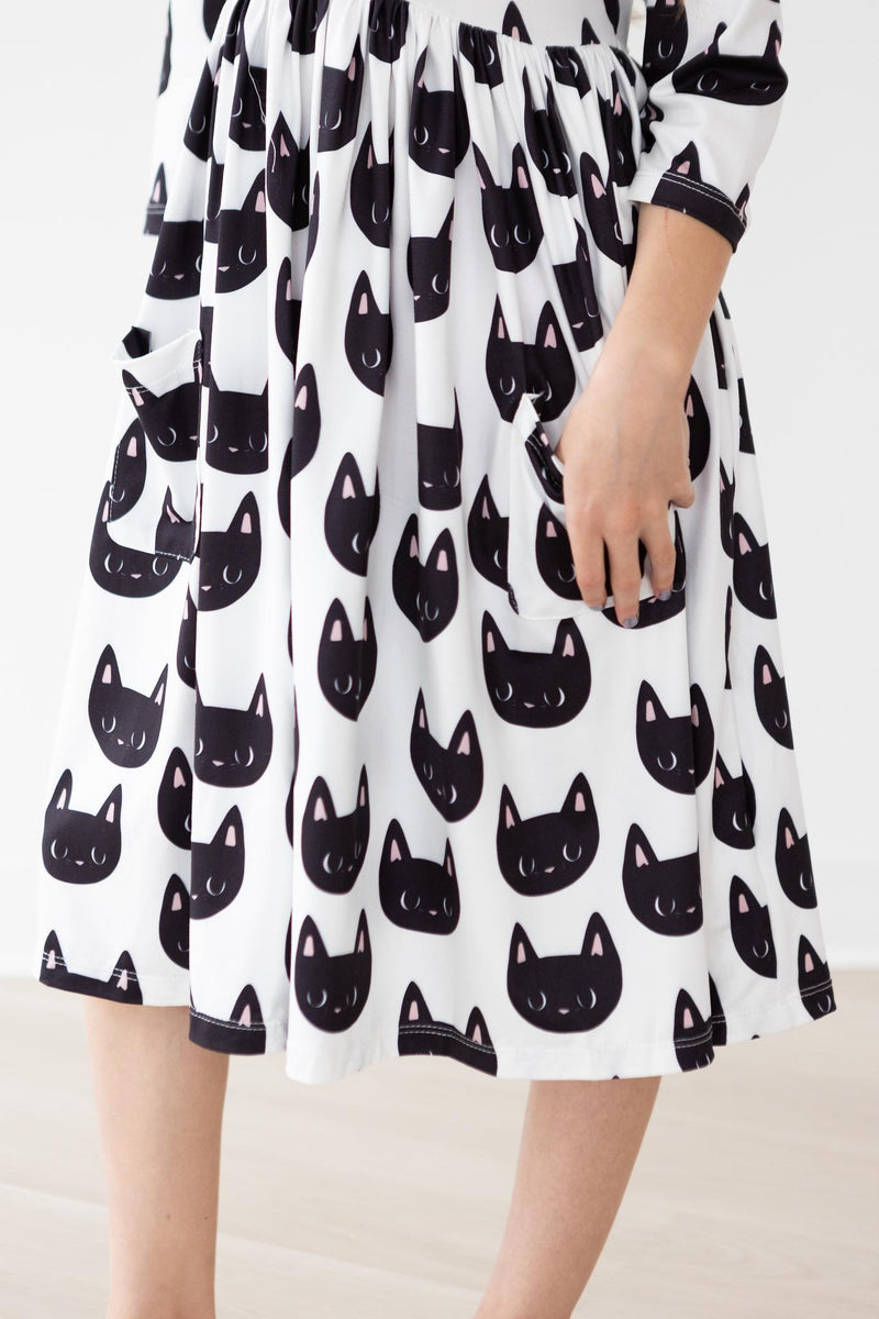 Purrfect Kleid mit schwingendem Rock – 3/4-Ärmel, Taschen