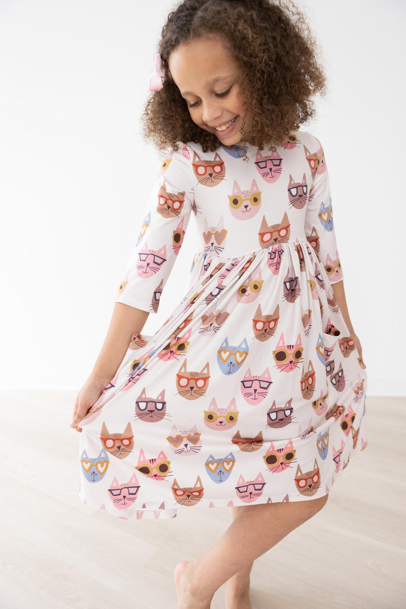 Cattitude Kleid mit schwingendem Rock – 3/4-Ärmel, Taschen