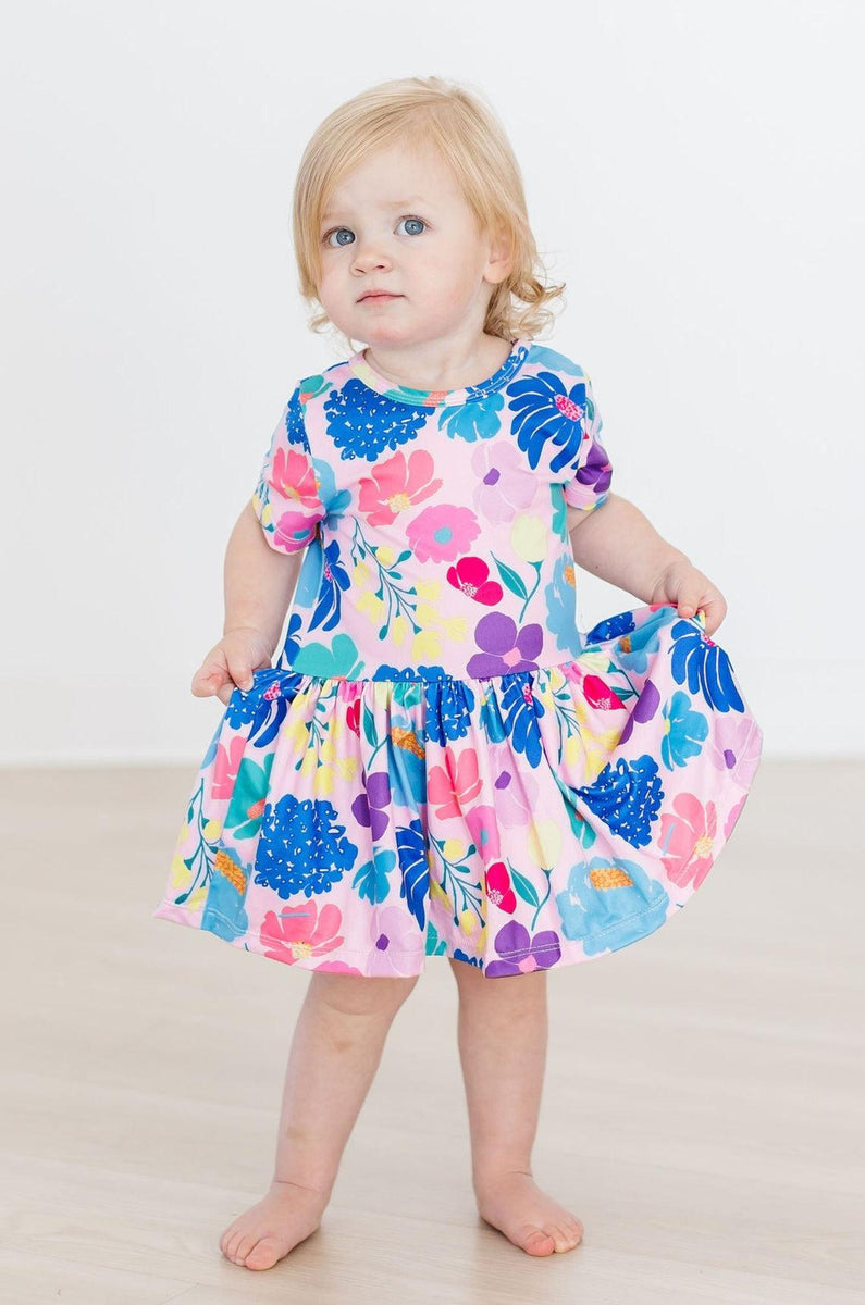 Dahlia Dreams Body mit schwingendem Rockteil – Kurzarm